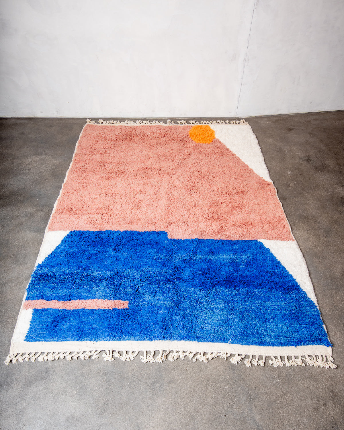 Modern, designer, handcrafted Berber rug from Morocco. Beniourain carpet with beautiful colours and patterns and fluffy wool texture.